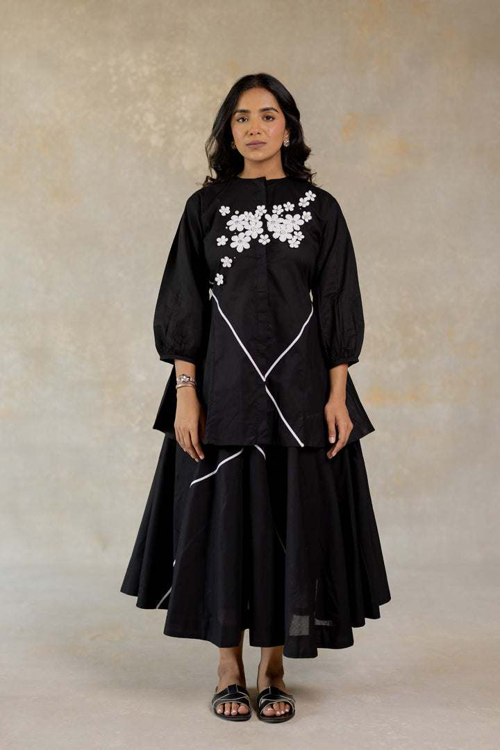 Black skirt-set with floral details