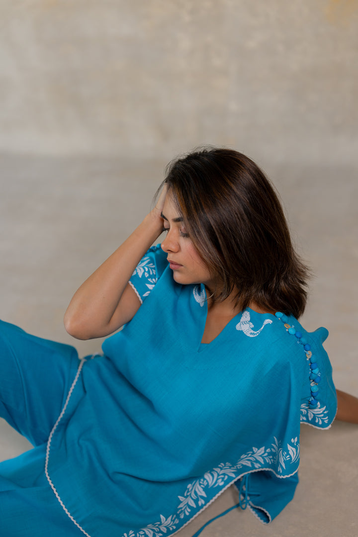 Blue poncho co-ord with floral print