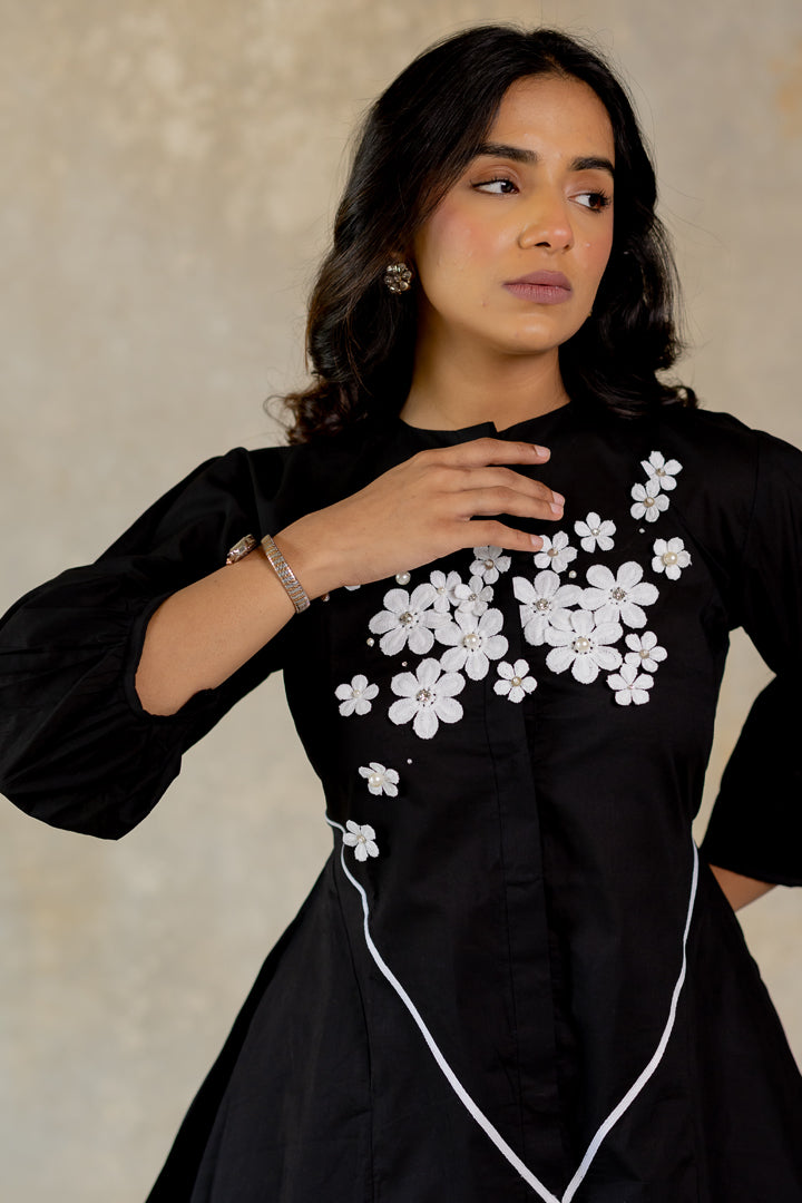Black skirt-set with floral details