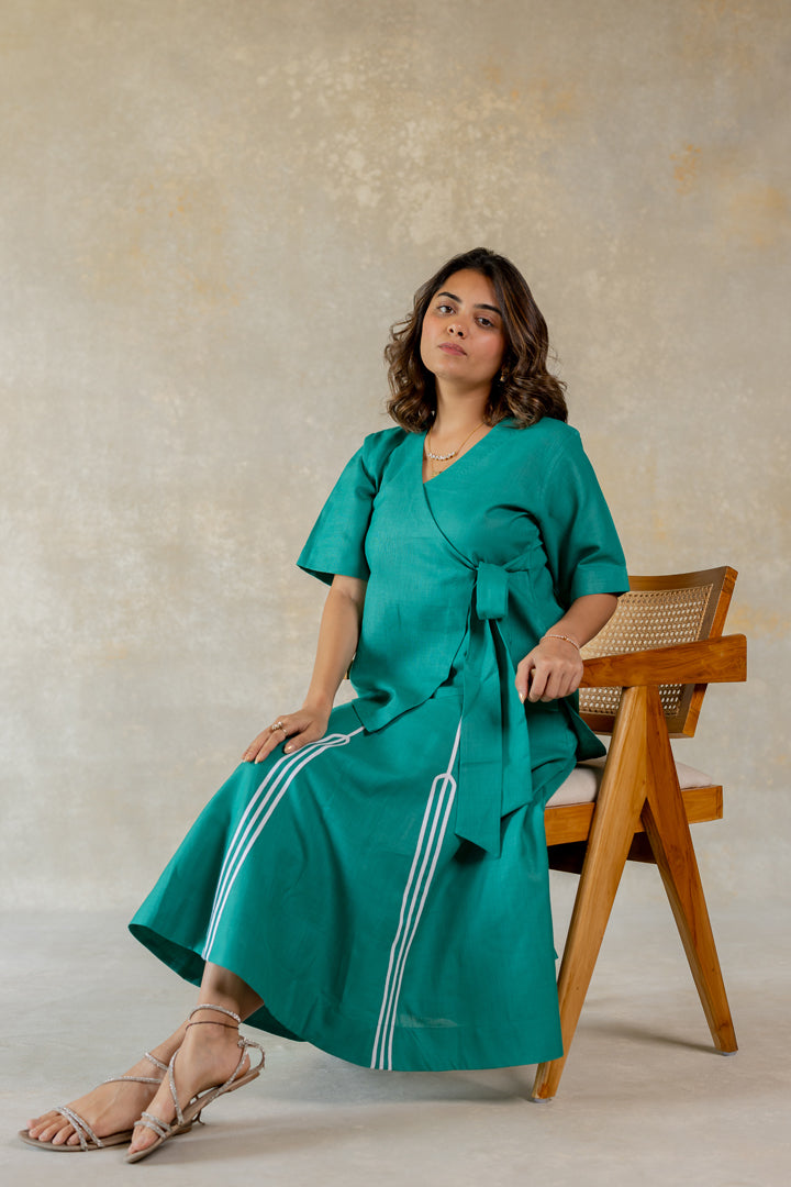 Teal knot dress with line abstract