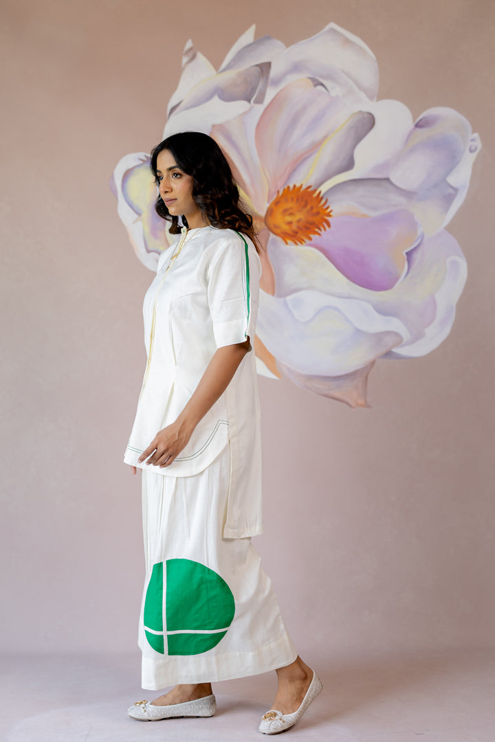 White co-ord with wide-leg pants and shape abstract